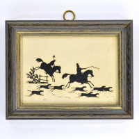 Front of silhouette, in frame, with hunting scene.