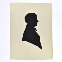 Front of Silhouette, in frame, with man looking right