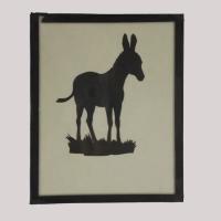 Silhouette of a donkey looking right