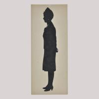 Silhouette of a woman looking left