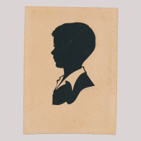 Front of silhouette, with boy looking left.