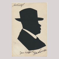 Front of silhouette, with man looking right, in suit and wearing a hat.