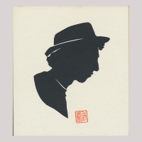 Front of silhouette, with man looking right, wearing a hat.