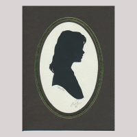 Front of silhouette, with girl in frame looking left.