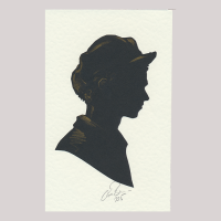 Front of silhouette, with boy looking right, wearing a hat.