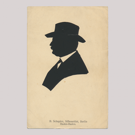 
        Front of silhouette, Man wearing a hat and looking to the left