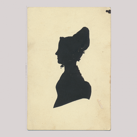 
        Front of silhouette, with woman looking left, wearing a bonnet.