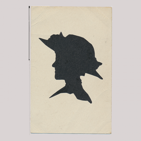 
        Front of silhouette, with woman looking left, wearing a hat with floral motif.