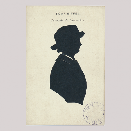 
        Front of silhouette, with child looking right, wearing a hat. Inscription in the top with Tour Eiffel, Souvenir de l'ascension.